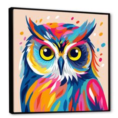 an owl with yellow eyes and multicolored feathers on a pink background canvas wall art print