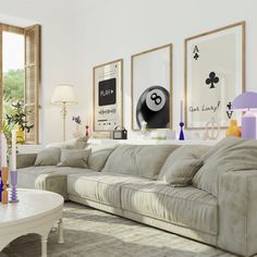 a living room filled with lots of furniture next to a large white table and window