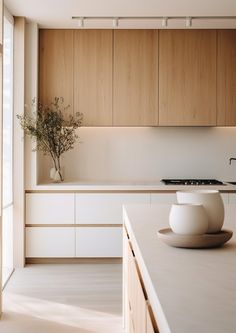 a white bowl sitting on top of a kitchen counter