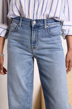 A cropped wide leg creates the chic silhouette of these 7 For All Mankind jeans. Perfect for day-to-night wear, the Alexa features raw ankle-length hems and soft stretch denim fabric in a faded blue wash. | 7 FOR ALL MANKIND Women's Cropped Alexa w Raw Hem Jeans, Size 30, Blue Article On Raw Hem Pants, Stretch Denim Fabric, Raw Hem Jeans, Hem Jeans, Fashion 101, Night Wear, 7 For All Mankind Jeans, Fall Shopping, Tee Dress