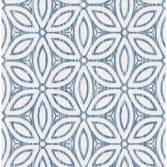 a blue and white pattern on fabric