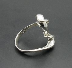 Sterling silver ring 925/1000. Stamped 925. Approximate weight 5.7 grams. Top width 2.7cm All our jewels are made from solid sterling silver 925/1000 and are carefully crafted by hand in our family workshop. We dispatch your orders in 5 working days, worldwide and the postage is $5. We ship registered priority mail. Please allow 5-7 working days for delivery in Europe and 10-15 working days outside Europe. For any questions - please do not hesitate to contact me! Sterling Silver Open Pearl Ring With Polished Finish, Unique Formal Sterling Silver Rings, Unique Sterling Silver Rings For Formal Occasions, Sterling Silver Pearl Ring With Polished Finish, Silver Sterling Silver Pearl Ring With Polished Finish, Sterling Silver Formal Bypass Ring, Classic Sterling Silver Bypass Ring Gift, Classic Sterling Silver Bypass Ring As Gift, Formal Sterling Silver Bypass Ring With Open Band