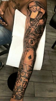 a man with a tattoo on his arm