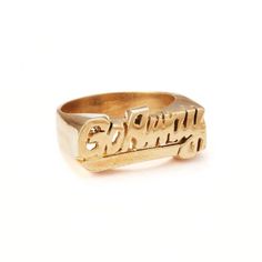 A perfect addition to your favorite stack - our signature nameplate rings are a quirky spin on an old school favorite. Guacamole? Winetime? Sweatpants? Whatever your passion... we GET you.Hand-carved unisex rings are available in sizes 5-13 - please contact us directly for any additional sizing needs.These items are handmade! Please allow 5-10 business days for rings to be sized and shipped. Rush shipping is available upon checkout. Nameplate Ring, Unisex Rings, Unisex Ring, Dream Jewelry, Stylish Jewelry, How To Make Notes, Rings Statement, Earings Piercings, Guacamole