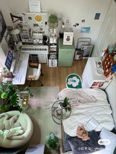 an overhead view of a bedroom with bed, desk and other items on the floor