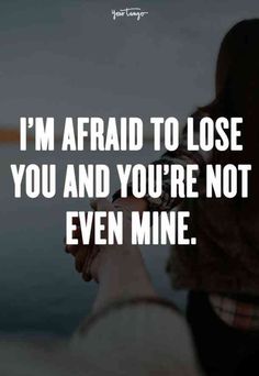 a woman holding her hand up to the sky with text saying i'm afraid to lose you and you're not even mine