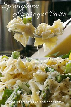 pasta with peas and cheese on a fork