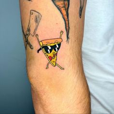 a man with a pizza slice tattoo on his arm