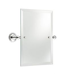 a bathroom mirror mounted to the side of a wall with two handles on each side