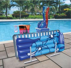 an inflatable pool float next to a swimming pool