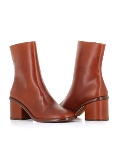 Rosewood brown soft vegetable tanned leather Ankle Boot from Chloè, featuring by a clean line, an upper adherent to the ankle, a contrasting welt and a side zip closure. Leather sole. Lined interior. Heel: 7,5 cmComposition: Leather | Chloé Women's Ankle Boot Meganne in Cognac | FW22/23 Tan Leather Ankle Boots, Womens Ankle Boots, Vegetable Tanned Leather, Leather Ankle Boots, Cognac, Side Zip, Chloe, Ankle Boot, Boots