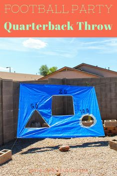 a backyard with a blue tarp covering it and the words football party quarter back throw