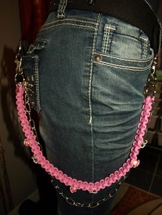 Pink 550 Paracord with silver sugar skull charms and pink and black polymer flower beads woven in. There is also a longer silver rolo style chain. This can be used to secure your wallet and keys or as a decorative accessory to your pants, jeans, or skirts. Pink 550, Pink Pant, Silver Wallet, Polymer Flowers, Silver Pants, Pant Chains, Paracord Keychain, Design Boards, Keychain Fob