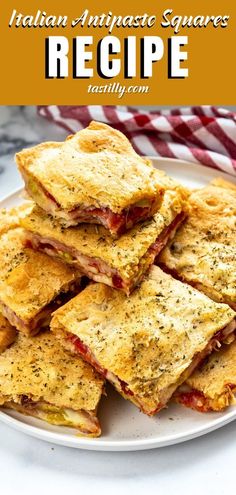 italian antipaste squares recipe on a white plate with red and yellow striped napkin