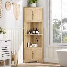 a wooden shelf with some bottles and soaps on it next to a bathtub