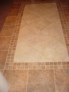 the bathroom floor is clean and ready to be used as a bathtub or shower