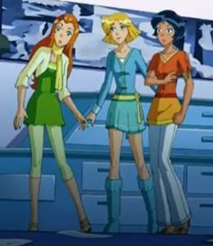 three young women standing next to each other