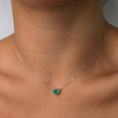 Celebrating love with this heart pendant chain necklace! A 1.25cts heart-shaped emerald. Crafted in 18K white or yellow gold. With Lobster claw clasp. 18K gold: 2.30 gr Emerald: 1.25cts Length: 16.5 in Width: 1mm Pendant: 7mm x 7mm Available in White Gold or Yellow Gold Natural, untreated gemstones Contact us to further customize SKU: NE0538 & NE0126 Emerald Heart Necklace, Solitaire Necklace, Jewelry Website, Diy Origami, Solitaire Necklaces, Tennis Necklace, Gold Heart, Jewelry Rings Engagement, High Jewelry