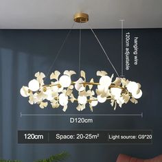 a large chandelier with flowers hanging from it's center, and measurements for each light fixture