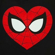 a close up of a spiderman face on a black shirt