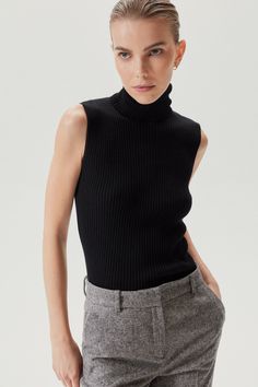 COMPOSITION: 100% Extrafine Merino Wool FIT: Fits true to size, take your usual size Designed for a close fit Aline is 1.74 m (5.70 ft) tall and wears size S DESIGNER NOTES: Rib stitch Roll-Neck Cuffs finished with small tubulars MATERIAL: 100% Extra-fine merino wool Extrafine Merino Wool Created from the selection of Extra fine Australian Merino wools according to strict qualitative parameters and innovative production processes, it stands out for being as shiny as silk and as soft as cashmere. Roll Neck Top, Elegant Blazers, Rib Stitch, Knitwear Fashion, Ribbed Texture, Turtle Neck Top, Roll Neck, Work Fashion, Cool Things To Make