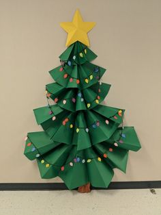 a christmas tree made out of folded paper