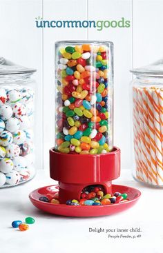 a candy dispenser filled with lots of candies