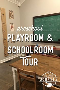 a room with a wooden table and chalkboard on the wall that says preschool playroom & schoolroom tour