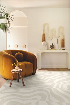 a living room filled with furniture and a white rug