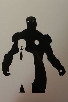 an iron man cut out on the wall