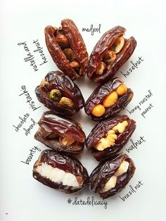 an image of dates with nuts labeled in the top and bottom half on a white surface