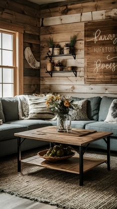 a living room filled with furniture next to a wooden wall covered in wood planks