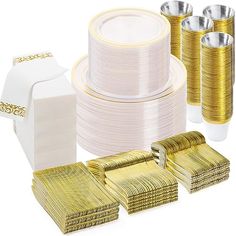 the gold and white tableware is ready to be used for dinner or desserts