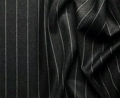 Experience the epitome of sophistication with our Classic Black Double-Breasted Pinstripe Symphony Suit from the renowned Symphony Collection. Expertly crafted with a luxurious wool feel, this timeless piece represents the confluence of tradition and modern elegance. The rich black hue adds an undeniable aura of prestige, making it a must-have staple in every man's wardrobe. Features: Double-Breasted 6x2 Button Configuration: Signifies power and grandeur, giving you a distinct and regal appearan Stripe Suit, Brown Pinstripe, Suit Collection, Pinstriping Designs, Beautiful Suit, Slim Fit Suits, Pinstripe Suit, Modern Gentleman, Fitted Suit