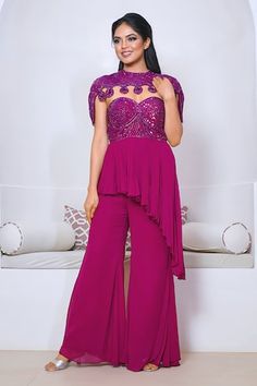 Wine peplum kurta with cutdana hand embroidered yoke and asymmetric hem. Paired with a plain sharara and cape with matching hand embroidery. - Aza Fashions Purple Sleeveless Wedding Set, Sleeveless Purple Party Set, Plain Sharara, Kurta Sharara Set, Kurta Sharara, Sharara Set, Buy Wine, Set For Women, Asymmetric Hem