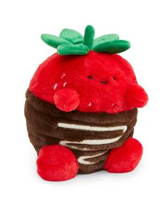 a stuffed animal with a chocolate covered strawberry on it's head, sitting in front of a white background