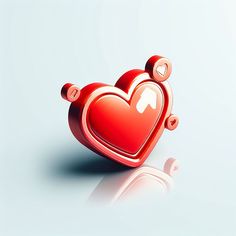 a red heart shaped object sitting on top of a blue surface