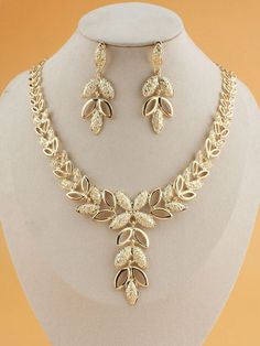 3pcs/Set Gold Jewelry Set Including Gold Leaf Necklace & Earrings, For Women. Suitable For Christmas, Valentine's Day, Mother's Day, Thanksgiving Day, Teacher's Day, Anniversary, Wedding, Party, Bridal Etc. Occasions, Also Suitable For Daily Wear. Yellow Gold    Zinc Alloy     Women Fashion Jewelry, size features are:Bust: ,Length: ,Sleeve Length: 30 Gms Gold Necklace Set, Set Gold Jewelry, Gold Jewelry Set, Gold Leaf Necklace, Gold Jewelry Sets, Women's Jewelry Sets, Gold Collar, Gold Necklace Set, Flower Pendant Necklace