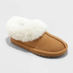 These Faux-Fur Cuff Scuff Slippers from Cat & Jack™ offer your child warmth and comfort with every step. Designed in a solid hue, these slippers are made from a soft fabric upper with a faux-fur cuff, cushioned footbed and comfy lining for all-day comfort. A closed-toe upper with a covered back, slip-on style and an indoor/outdoor outsole for all-purpose wear complete the design. Cat & Jack™: Designed for all children so you can trust it's made for yours. Construction For Kids, Suede Clogs, Clog Slippers, Loafer Slippers, Cat & Jack, Kid Shoes, Soft Fabric, Kids Shoes, Soft Fabrics