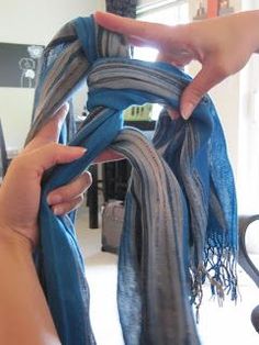 So Cute and So Easy! Here are the steps to How to Braid a Scarf from which I learned in Israel. Step One: Tie a basic knot, leave enough ... Ways To Tie Scarves, Braided Scarf, Tie Scarf, Scarf Tying, How To Wear Scarves