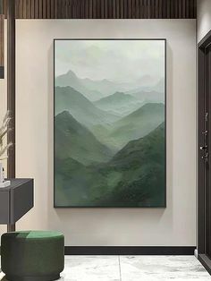 a painting hanging on the wall in a room