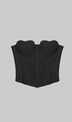 Introducing a luxurious addition to your wardrobe - the Strapless Corset Cropped Top in black. Crafted from the finest fabric, this elegant top features a corset-style bodice for a contoured, figure-hugging fit. Sophisticated and timeless, this piece exudes charisma and can easily be dressed up or down, making it the perfect must-have item for your wardrobe. Gentle Dry Clean OnlyColour may vary due to lighting on images. The product images (without model) are closest to the true colour of the pr Black Corset Shirts, Black Strapless Corset, Korsett Top, Corset Cropped, Celebrity Summer Style, Bandage Top, Corset Design, Top Corset, Black Corset Top