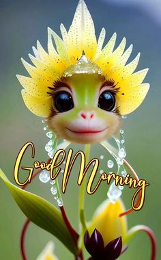 a close up of a flower with the words good morning in front of it and an image of a baby gecko