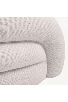 the back end of a white couch