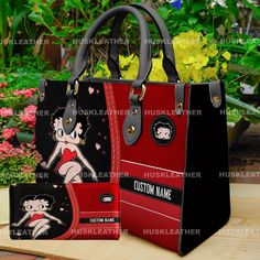 Betty Boop Cartoon Women Leather Handbag,Betty Boop Wallet,Custom Leather Bag,Personalized Bag, Betty Boop Lover's Handbag,Gift For Mom Product Description: Upgrade your style with this New Version Luxury Women PU Leather Handbag. Crafted from premium PU leather, this handbag features a smooth zipper and sturdy top handles for comfortable carrying. Available in three sizes, it offers versatility and convenience for any occasion. Perfect gift for girls, moms, and office ladies. Ideal for commutin Betty Boop Handbags, Betty Boop Purses, Custom Leather Bag, Cartoon Women, Betty Boop Cartoon, White Handbag, Handbag Wallet, Women Leather, Personalize Bag