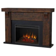 an image of a fireplace with fire in the center and logs on it's sides