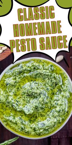 a bowl filled with pesto sauce on top of a wooden table