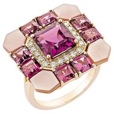 This lovely pinkish-red rhodolite ring is set in an octagon shape! The mother of pearls that embrace the ring's four corners add to its beauty and elegance. This trendy ring is suitable for any event or gathering. These gemstones with diamonds are set in rose gold for a rich and royal appearance. Rhodolite Fancy Ring in 18Karat Rose Gold with Pink Mother of Pearl, and White Diamond. Rhodolite: 3.18 carat, 8X8mm size, octagon shape. Rhodolite: 3.41 carat, 4.00mm size, princess shape. Pink Mother of Pearl: 2.88 carat, 5.00mm size, fancy shape. White Diamond: 0.25 carat, 1.50mm size, round shape, G color, VS clarity. Gold: 6.736g, 18Karat Rose Gold. R1678 Octagon Shape, Fancy Rings, Trendy Ring, Four Corners, Mother Pearl, Jewelry Lover, White Diamond, Luxury Jewelry, Fashion Rings