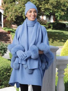 You can keep warm and be ever so glamorous in this luxurious matching poncho set (Items sold separately). Crafted of 100% cashmere, in Blue, the poncho features fox fur edges on the arms. The beanie hat becomes a true fashion statement when it's topped with a fun, fox fur puff. Tie it, wrap it or drape it any way you wish—this soft and classy scarf will keep you warm and turn heads with its four whimsical fox fur pom poms. The fox fur trim turn a pair of simple Blue gloves into a style setter, t Pillows Luxury, Italian Bed, Luxury Nightwear, Knitting Hacks, Luxury Pillow, Luxury Linens, Luxury Pajamas, Blue Gloves, Simply Fashion