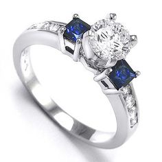 three stone diamond and sapphire engagement ring